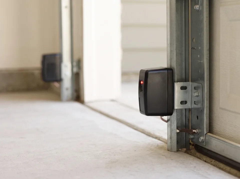 Garage door photo-eye safety sensor